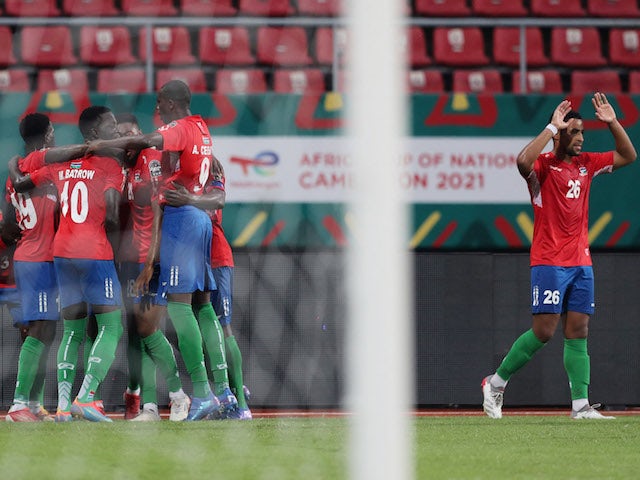 Ablie Jallow dari Gambia merayakan gol pertamanya bersama rekan satu timnya pada 12 Januari 2022